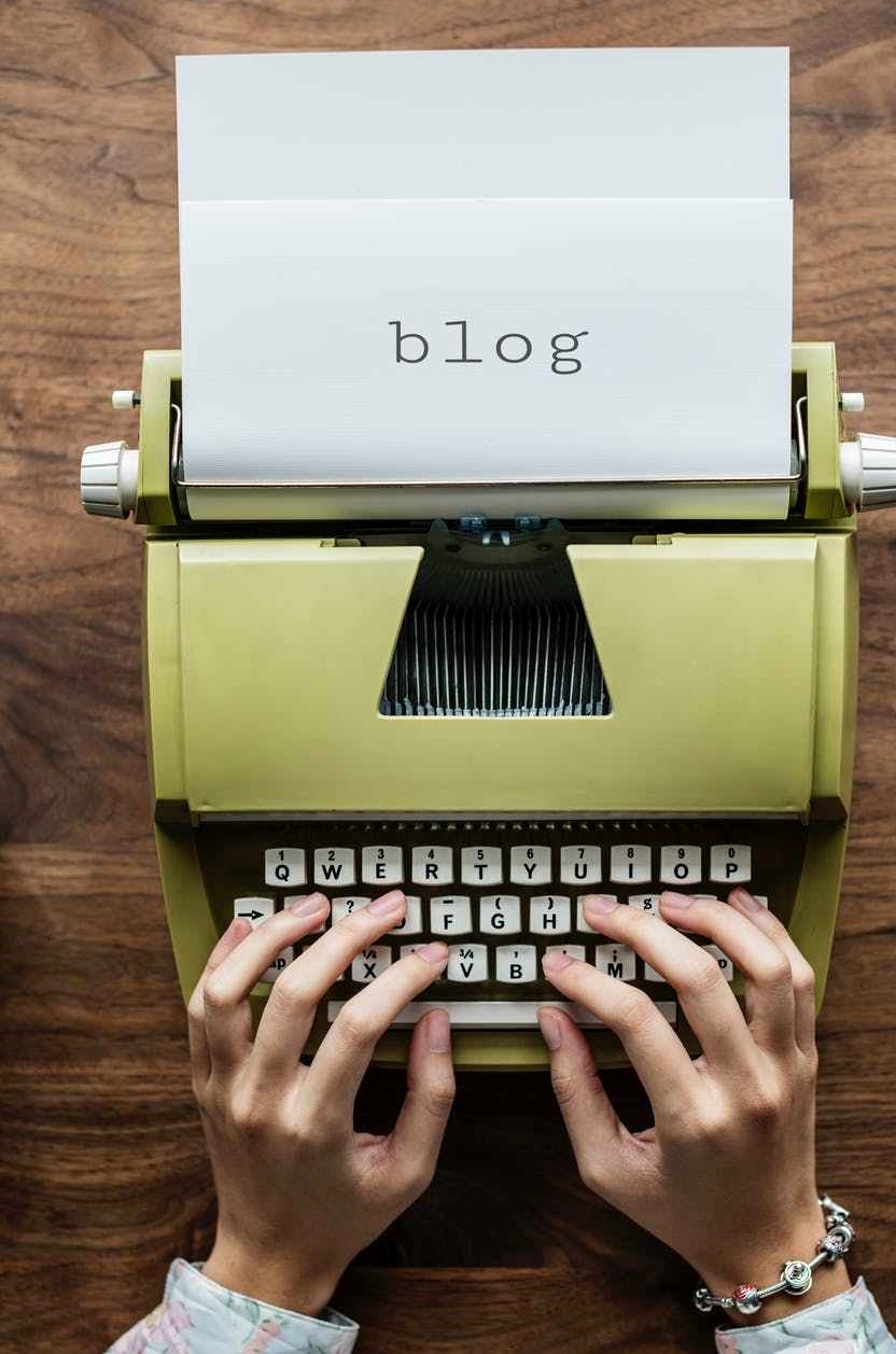 person using typewriter